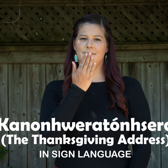 Photo of a woman doing sign language and the words the thanksgiving address